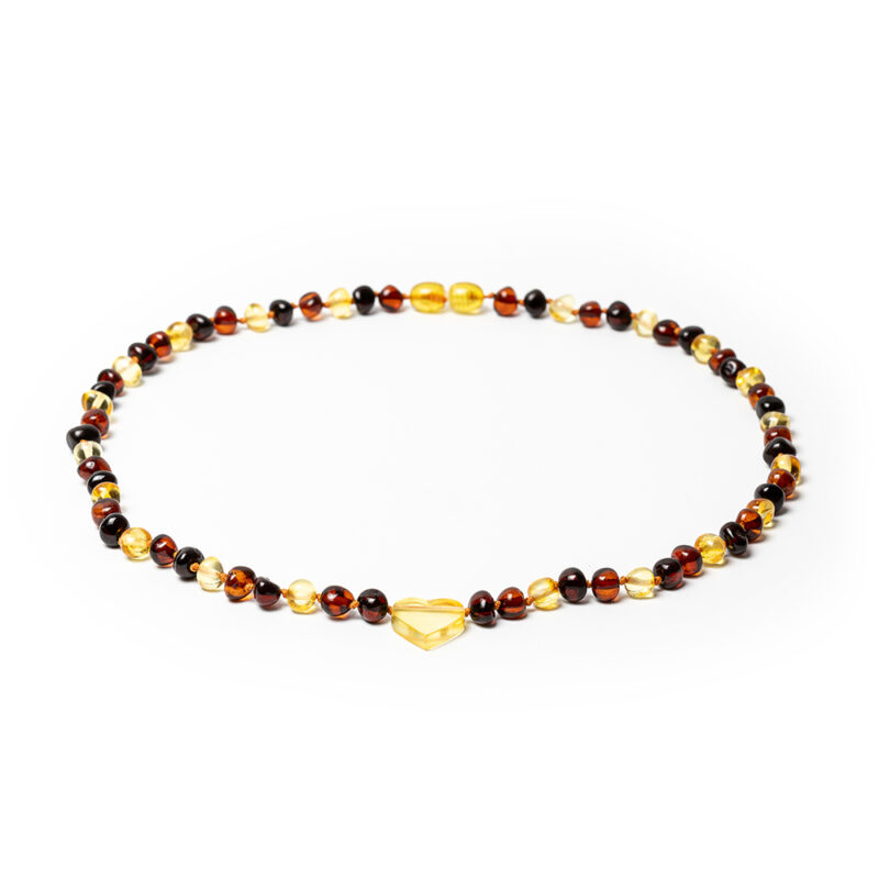 Elegant amber beads with a decorative pendant Heart