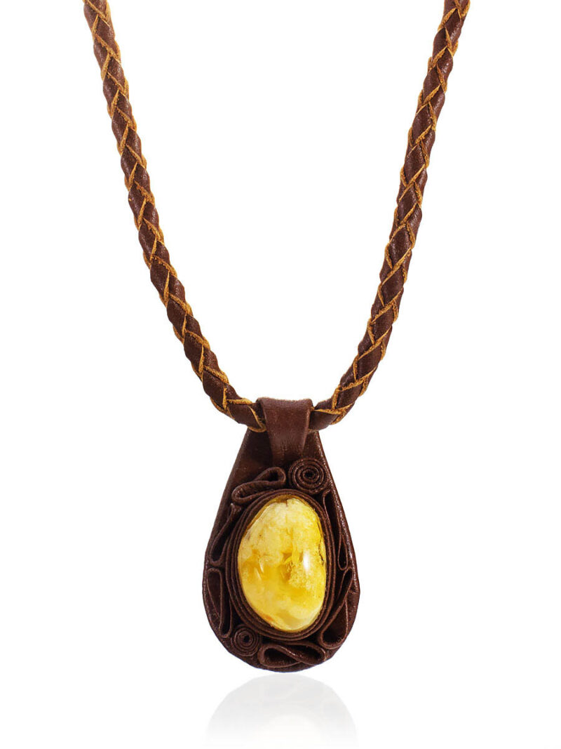 Large pendant made of natural amber on a leather cord