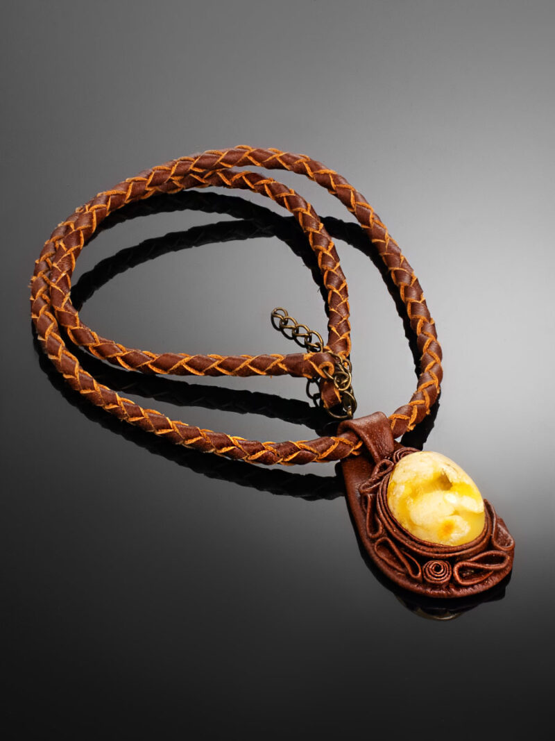 Large pendant made of natural amber on a leather cord - Image 3