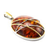 Pendant Meridian made of natural Baltic amber in a rich cognac color - Image 4