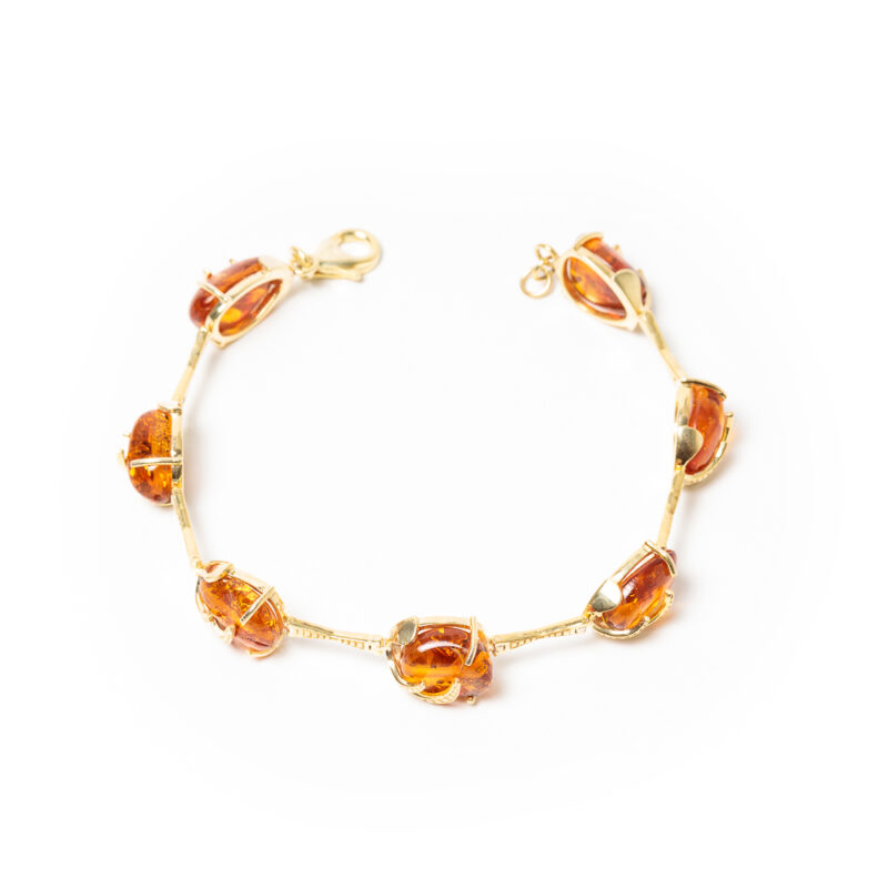 Gold plated bracelet with amber stones made at Cara jewellery