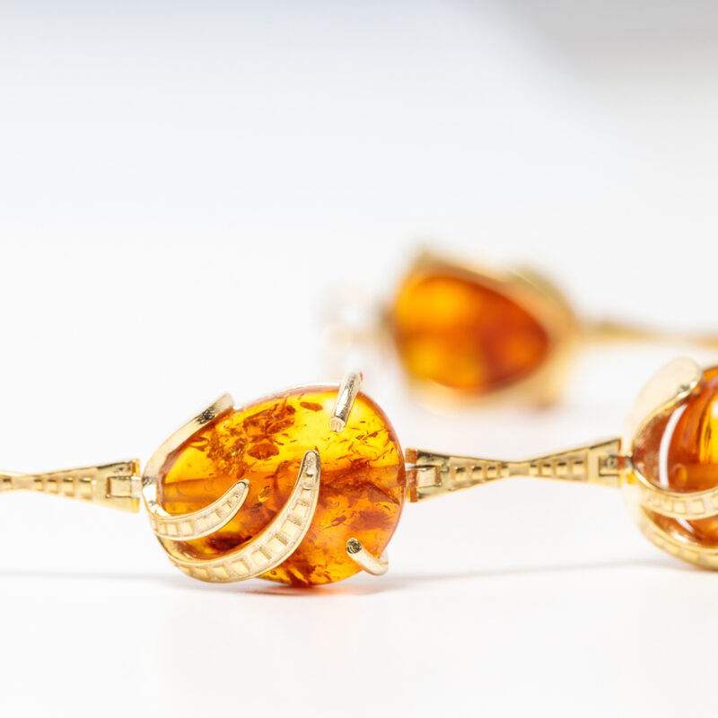 Gold plated bracelet with amber stones made at Cara jewellery - Image 4