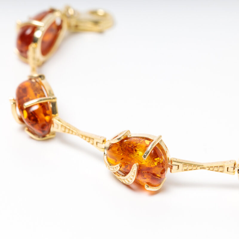 Gold plated bracelet with amber stones made at Cara jewellery - Image 5